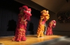 Lion Dance: MFA Three lion dance lions performing on stage